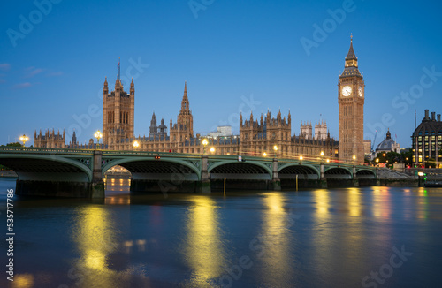 Big Ben and Westminster bridge at dawn in London. England