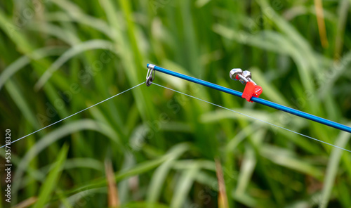 Fishing rod in nature in summer. © schankz