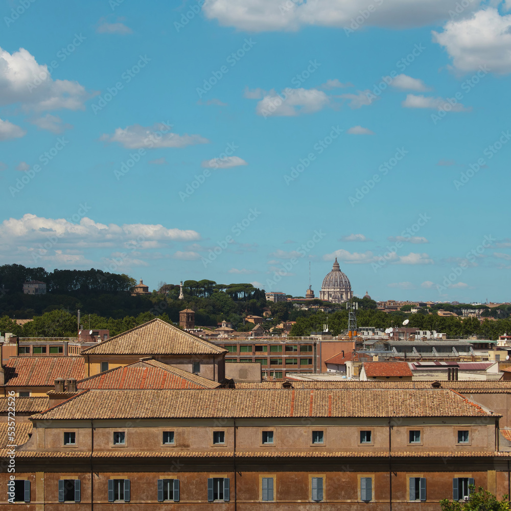 Panoramic view of Basilica St. Peter dome and rooftops of Rome, Italy