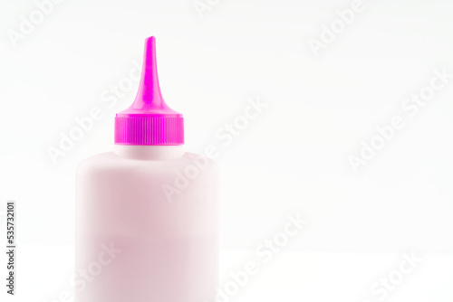 A tube of lubricant on a white background. Space for text © Vitaly_MOKK