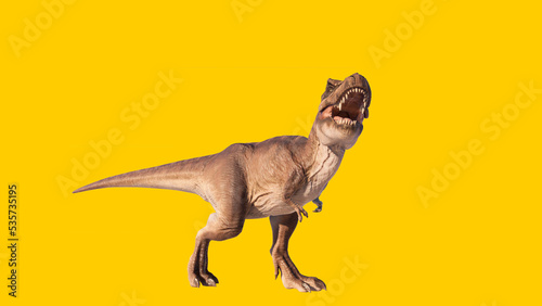 Tyrannosaurus rex isolated on yellow background © akiratrang