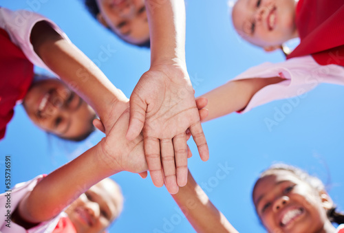 Hands, children and community with girl collaboration on environment cleaning project, happy and excited. Earth, goal and volunteer program with kids enjoying social and pollution cleanup outdoors