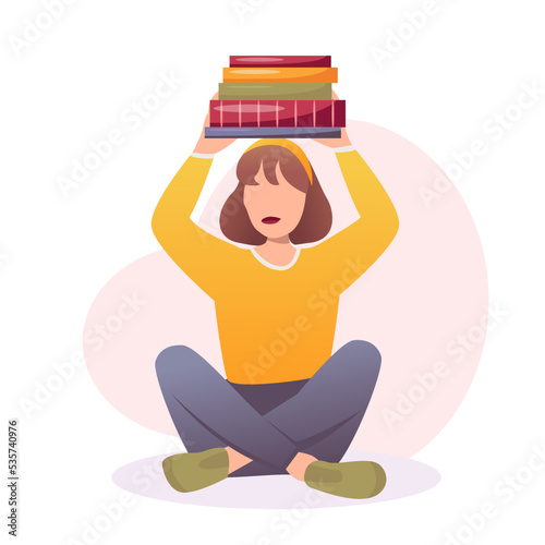 Fotografie The girl is holding a huge stack of books