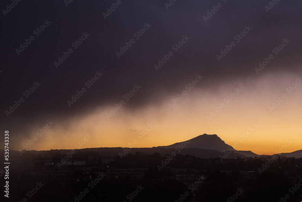 Sainte Victoire mountain in the sun of an autumn morning with thick fog Sainte Victoire mountain in the sun of an autumn morning with thick fog