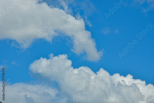 White clouds against blue sky for a backgrounds © nuwatphoto