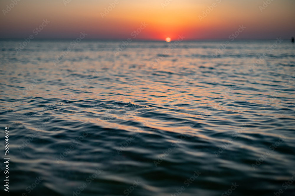 Obraz premium Close up of sea surface on sunset. Water background