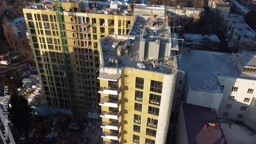 Building external wall thermal insulation with mineral wool. Exterior passive house wall heat insulation with mineral wool. Insulation the facade of commercial building. Energy efficiency