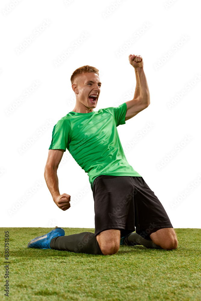 Excited football player shouting, expressing win emotions isolated over white background. Sport, win, victory, champion and success concept