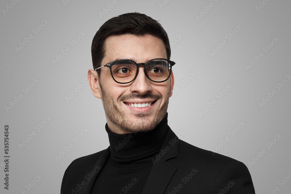 Contemporary business man with side look isolated on grey Contemporary business man with side look isolated on grey