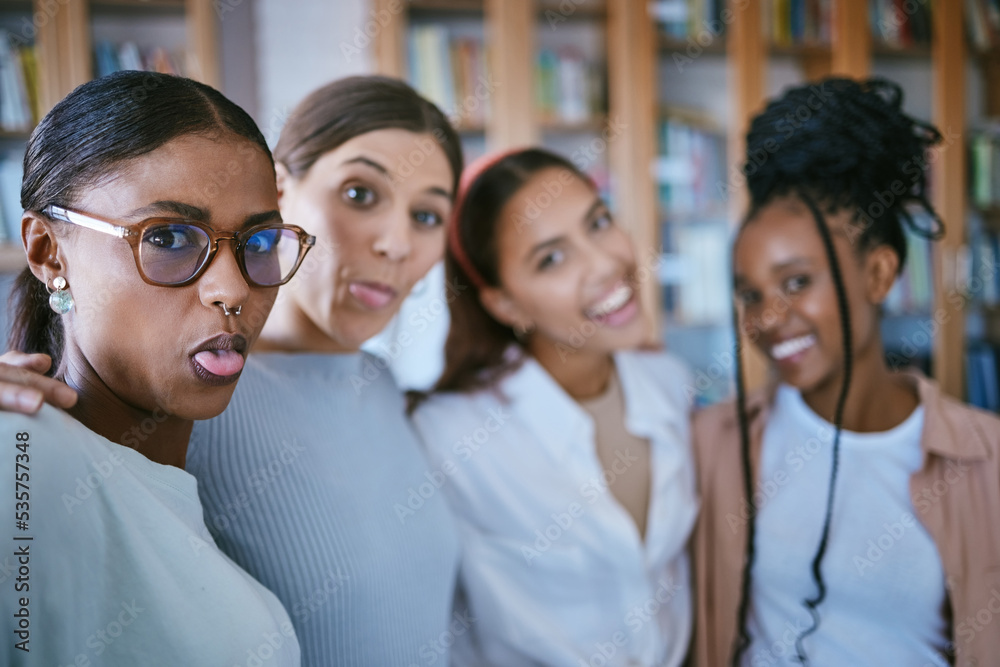 Fototapeta premium Education, friends and selfie of students in library for social media, diversity and support in university. Learning, vision and happy with women in college together for knowledge, trust and study