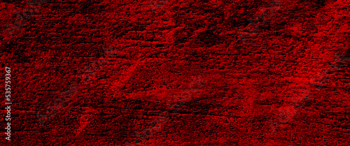 Red textured concrete wall background, grunge dark royal red color abstract paper or marbled granite stone rock wall texture background with grain distressed design. 