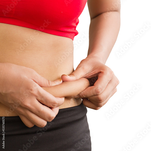 woman hand holding belly fat or fatty waist love handles