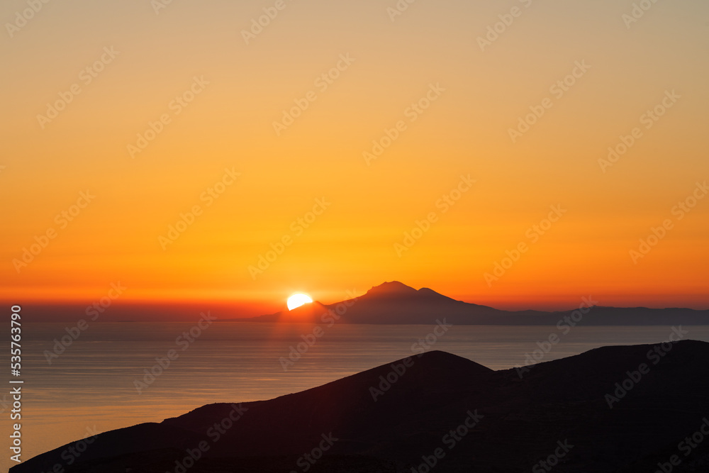 Amazing colourful sunset from Folegandros Island with the Aegean sea. Cyclades of Greece. Amazing colourful sunset from Folegandros Island with the Aegean sea. Cyclades of Greece.