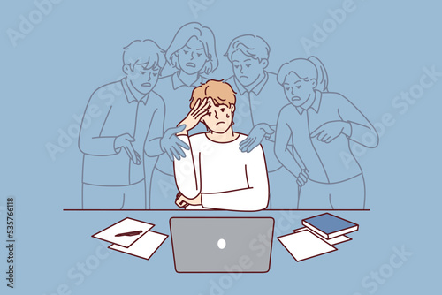 Stressed young man feel pressure by society opinion working on computer. Distressed male employee frustrated with annoying imaginary colleagues. Vector illustration.