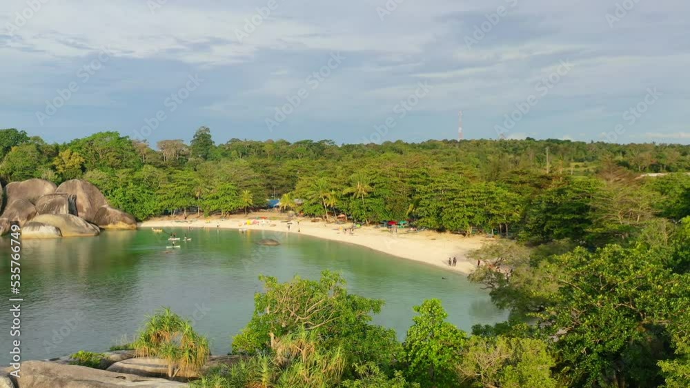 aerial landscape of tropical Tanjung Tinggi Beach at golden hour sunset in Belitung Indonesia aerial landscape of tropical Tanjung Tinggi Beach at golden hour sunset in Belitung Indonesia