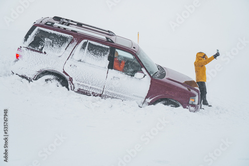Woman suffered an accident in the snow with her car in the middle of a freezing storm.