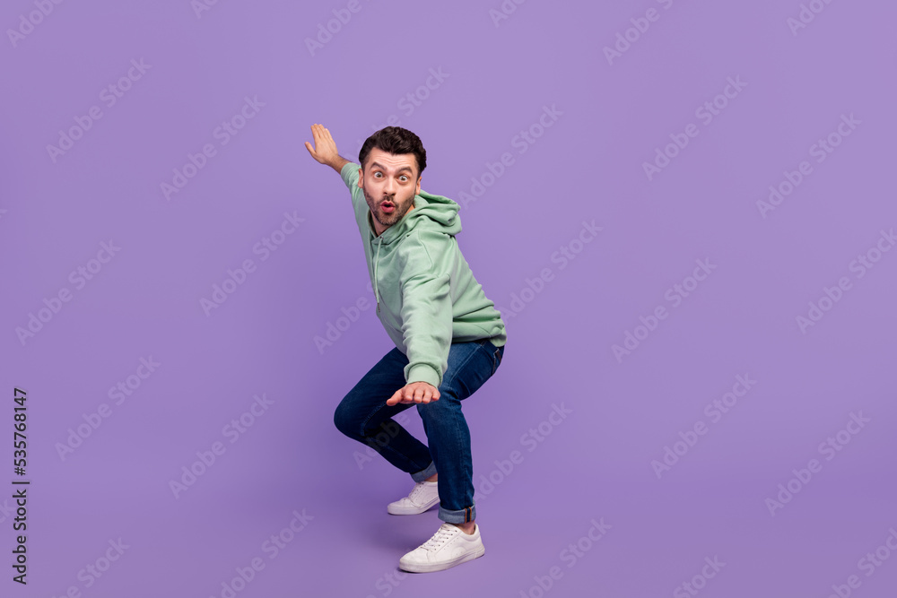 Full length body photo of young excited shocked man pouted lips look you unexpected reaction big winter sale prices isolated on violet color background