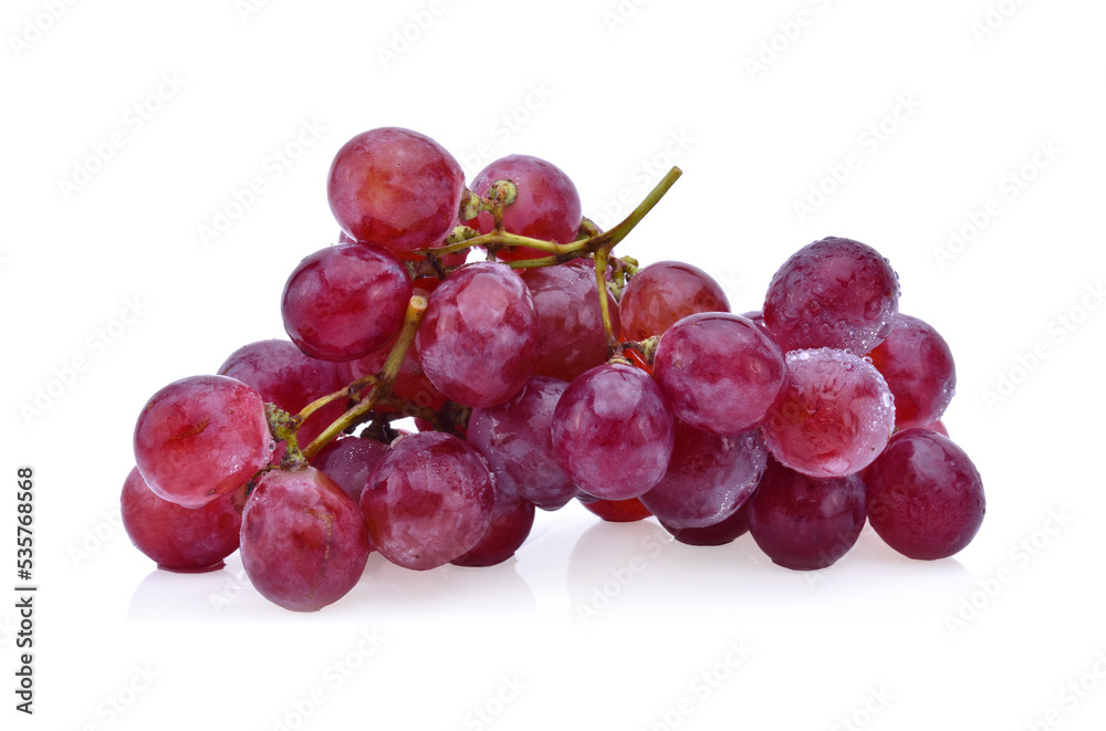 Bunch of red grapes with water drops isolated on white background Bunch of red grapes with water drops isolated on white background