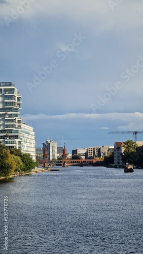 Vertical daytime view of the river in Berlin, Germany