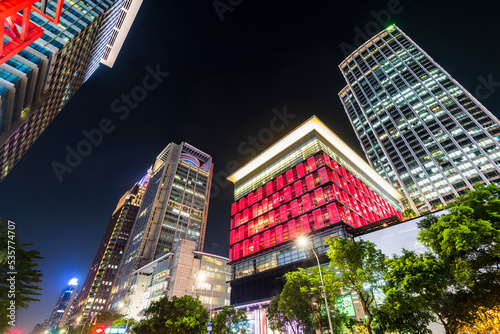 Night view of modern buildings in Xinyi District, Taipei, Taiwan. the District is Taipei's main shopping area, anchored by several department stores and malls.