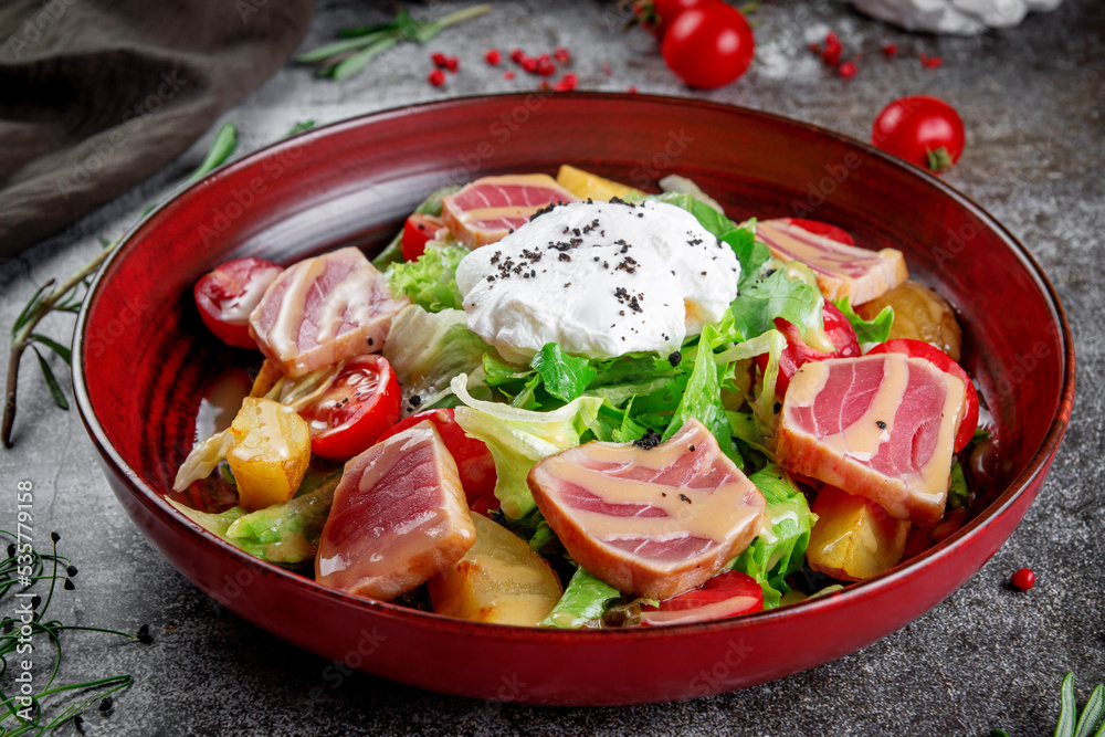 Strachatella. Sea fresh green salad mix with tuna, poached egg, cherry tomatoes and potatoes. Strachatella. Sea fresh green salad mix with tuna, poached egg, cherry tomatoes and potatoes.