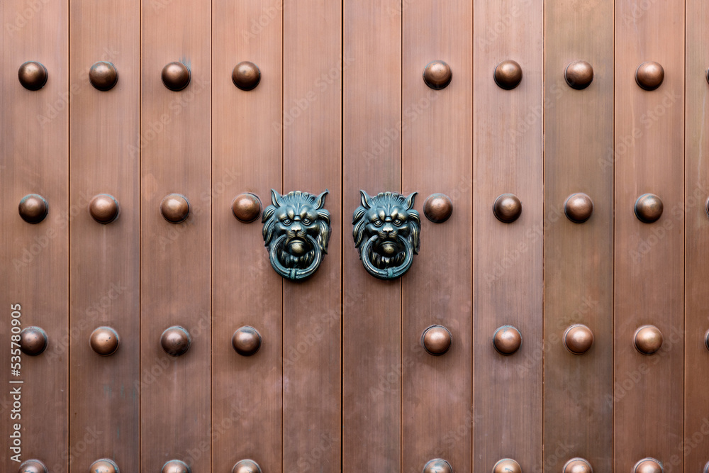 The door and knockers of Chinese temple The door and knockers of Chinese temple
