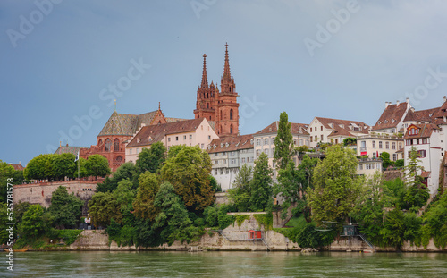 Buildings in the city centre of Basel and the Rhine river, Switzerland. Riverside of swiss city with Basel Cathedral