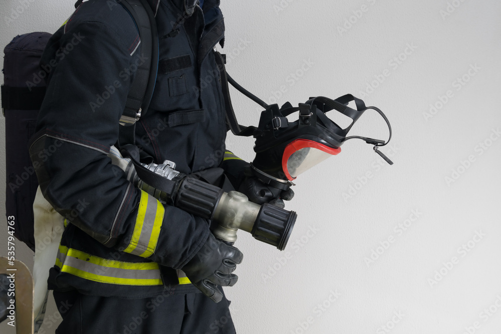close-up of specialized equipment for extinguishing fires in a smoky area close-up of specialized equipment for extinguishing fires in a smoky area