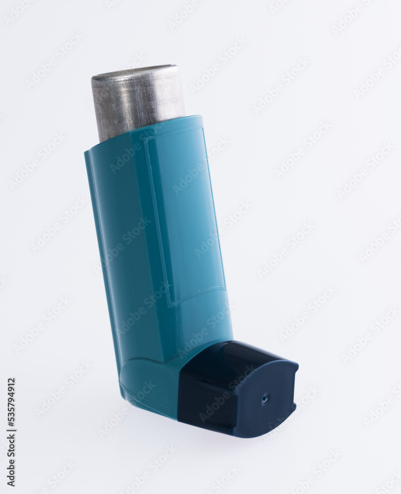 Close up of asthma inhaler on white background
