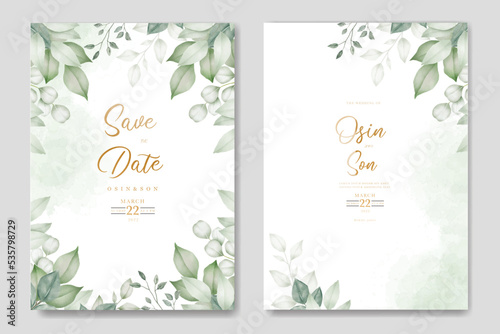 Watercolor wedding invitation card in green leaves 