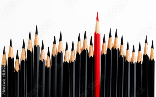 Red pencil standing out from the crowd