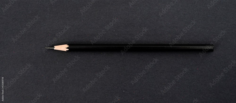 Black pencil on black background Black pencil on black background