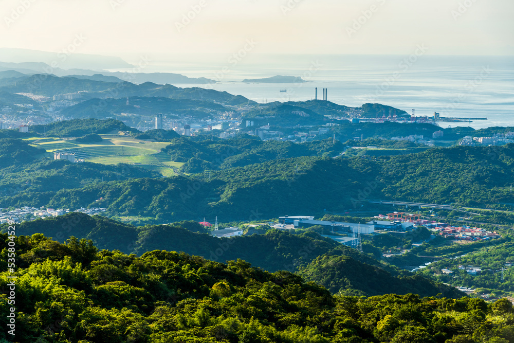 Fototapeta premium Spectacular view of the Coastal Mountains overlooking New Taipei City and Keelung in Taiwan. View of the North Coast of Taiwan.