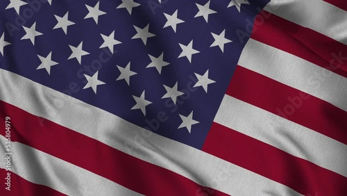 The flag of the United States of America that is waving in the wind.