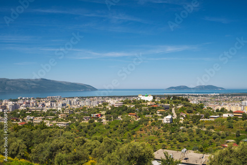 Attractive spring cityscape of Vlore city from Kanines fortress. Captivating morning sescape of Adriatic sea. Spectacular outdoor scene of Albania, Europe. Traveling concept background © netdrimeny