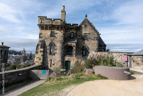 Calton hill with neoclassical monuments and striking view of the urban skyline