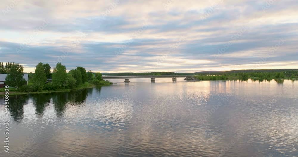 Tranquil River With Mirror Reflections During Sunset In Lapland, Sweden. Aerial Drone Shot Tranquil River With Mirror Reflections During Sunset In Lapland, Sweden. Aerial Drone Shot