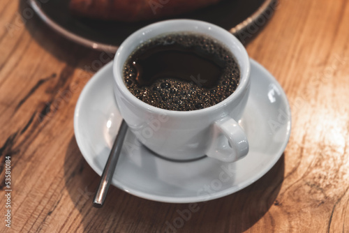 Fototapeta Naklejka Na Ścianę i Meble -  Black coffee. White cup of filter coffee
