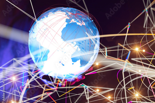 Businessman touching global...