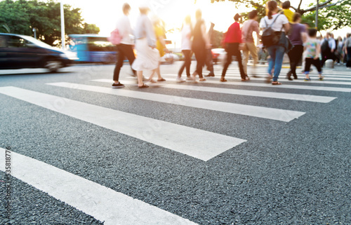 Group of people walking on the crosswalk