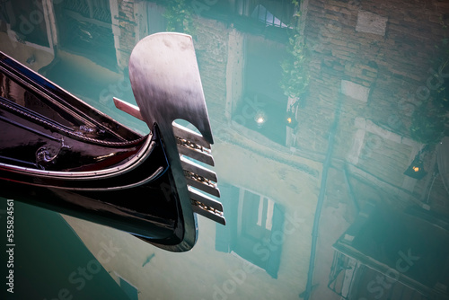 Bilde på lerret Gondola on turquoise water on canal in Venice