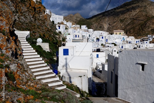 Dramatic view of the town of Chora in Serifos island, Greece under cloudy sky