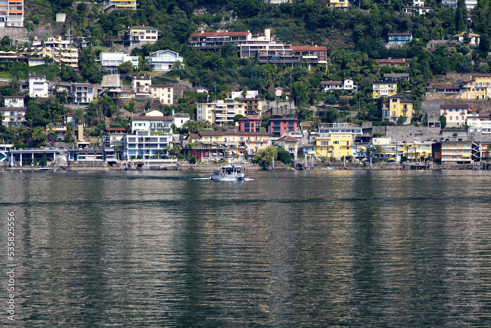 Passenger ship named Cicogna arriving at Brisago Islands, Canton Ticino, on a sunny summer day. Photo taken July 25th, 2022, Brisago Islands, Switzerland.