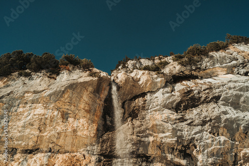 Alpine Waterfall in Fall