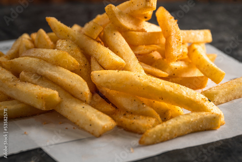  Side of french fries on a white plate