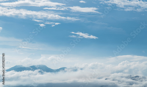 Fototapeta Naklejka Na Ścianę i Meble -  Aerial view of mountains with clouds