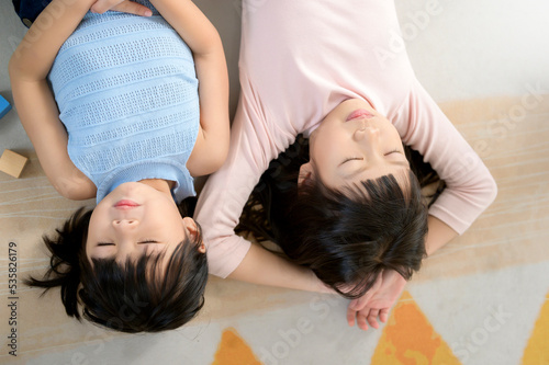 Asian kids enjoy playing in home , family lifestyle concept
