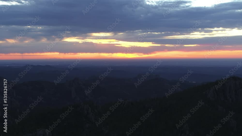 Slow aerial approach, flying over the Cathedral Spires, South Dakota, at sunset. Slow aerial approach, flying over the Cathedral Spires, South Dakota, at sunset.
