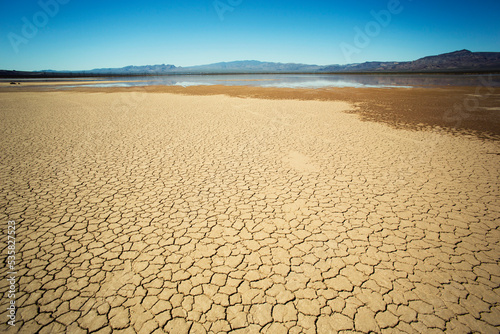 Rainfall water on cracked dry lake bed