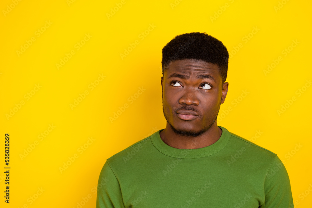 Portrait of attractive minded brunet guy making decision copy space isolated on bright yellow color background Portrait of attractive minded brunet guy making decision copy space isolated on bright yellow color background